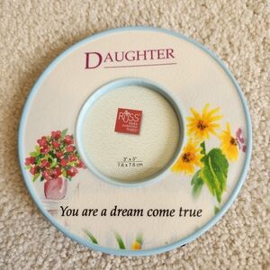 3 Picture Frames various sizes. The daughter frame makes a perfect gift.